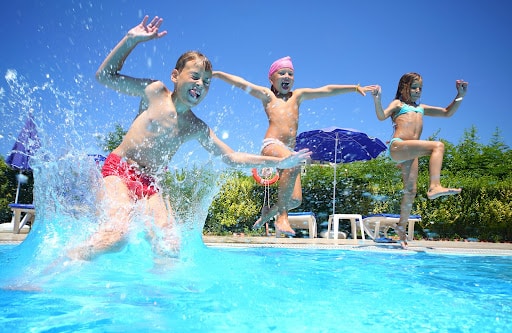 kids enjoying pool | hoa community